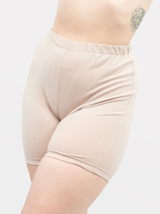 Beige shorts under skirts